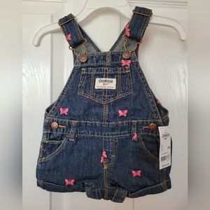 Oshkosh toddler girl overall shorts. Blue with pink butterflies.  Size 6 months